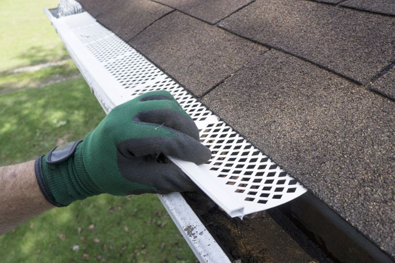 Gutter system with leaf guard
